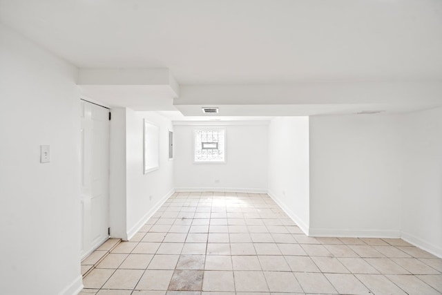 view of tiled spare room