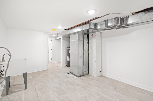 basement featuring electric water heater