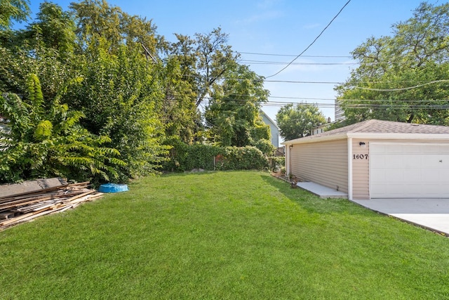 view of yard with a garage