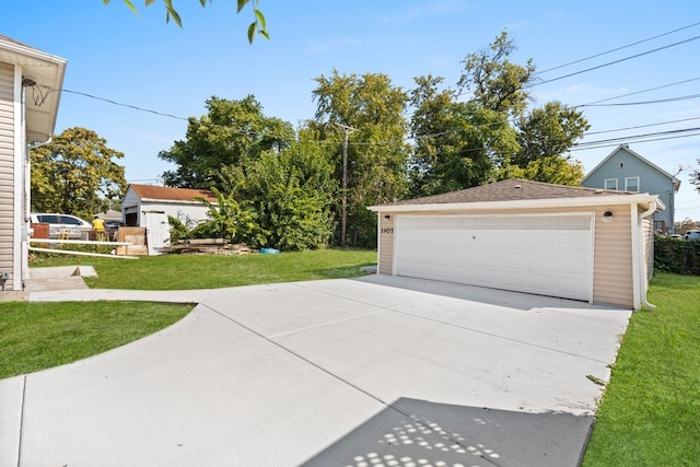 garage with a yard