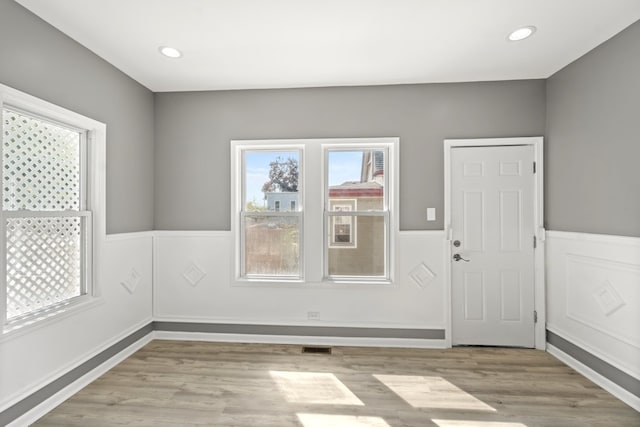 empty room with light wood-type flooring