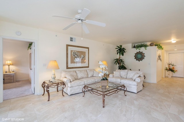 living room featuring ceiling fan