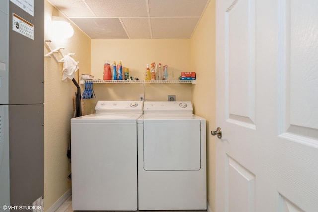 clothes washing area featuring washing machine and dryer