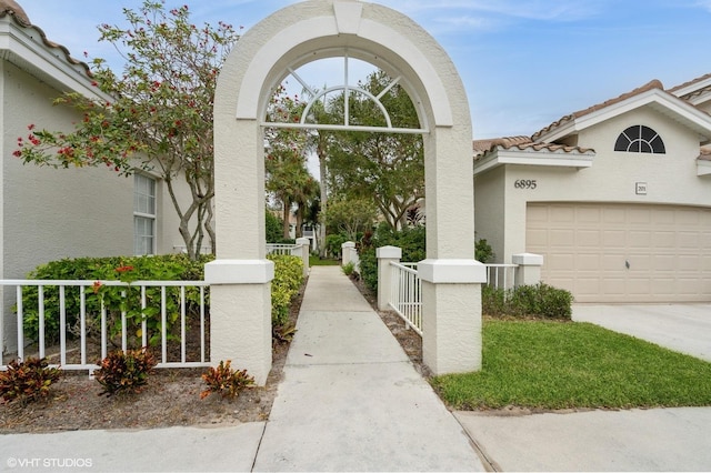 entrance to property featuring a garage