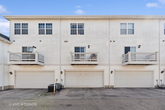 back of property with central air condition unit