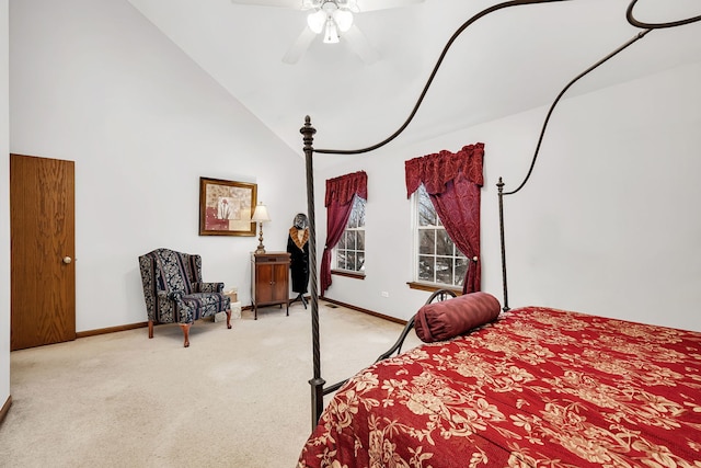 bedroom featuring ceiling fan, light colored carpet, and high vaulted ceiling