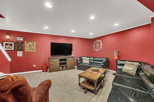 carpeted living room featuring ornamental molding