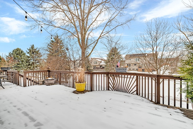 view of snow covered deck