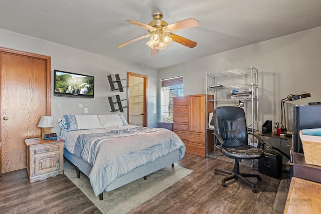 bedroom featuring ceiling fan and dark hardwood / wood-style flooring