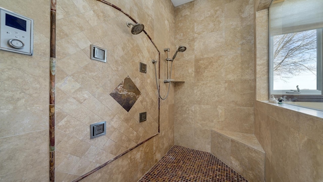 bathroom featuring tiled shower