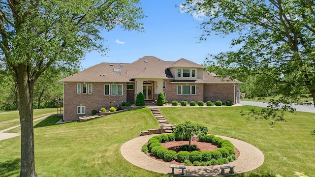14481 Berglund Rd, Pecatonica, IL 61063 - view of front of house with a front yard and brick siding