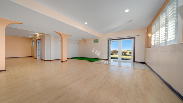 empty room with light hardwood / wood-style floors