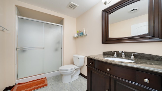 14481 Berglund Rd, Pecatonica, IL 61063 - full bathroom featuring toilet, a stall shower, vanity, and baseboards