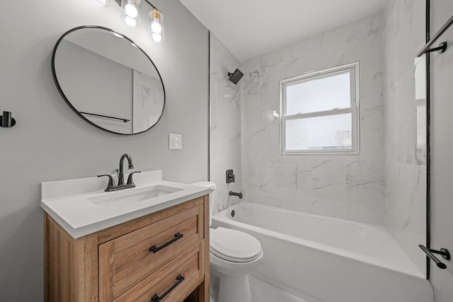 full bathroom with vanity, toilet, and tiled shower / bath combo