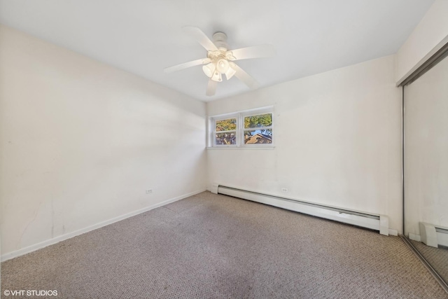 empty room with baseboard heating, carpet, and ceiling fan