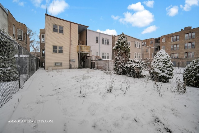 view of snow covered property