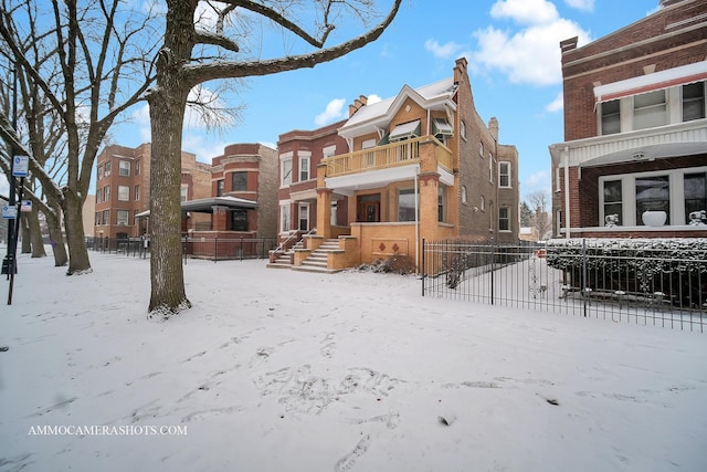 view of snow covered property