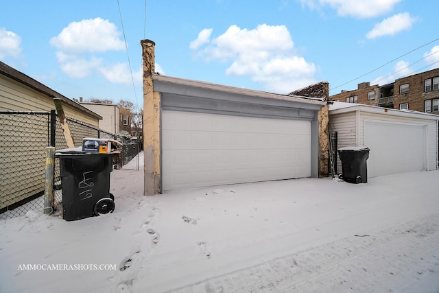 view of snow covered garage