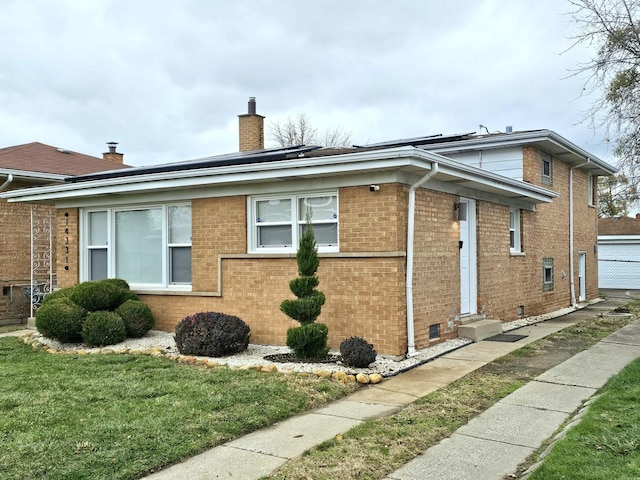 view of property exterior with a lawn