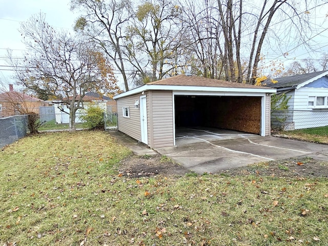 garage with a yard