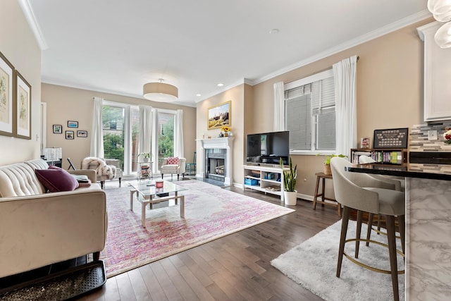 living room featuring dark wood-type flooring and crown molding