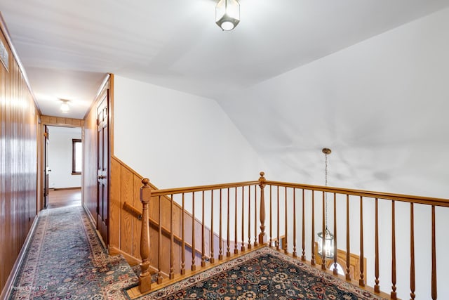 corridor with vaulted ceiling