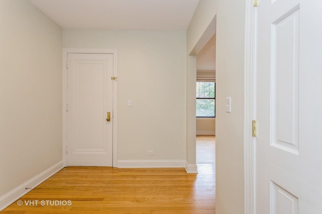 hall with light wood-type flooring