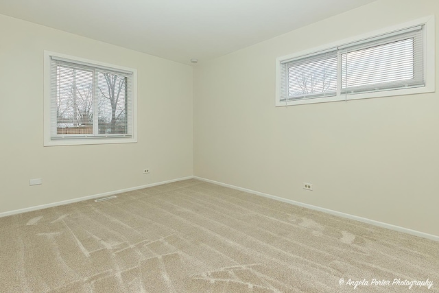 view of carpeted spare room