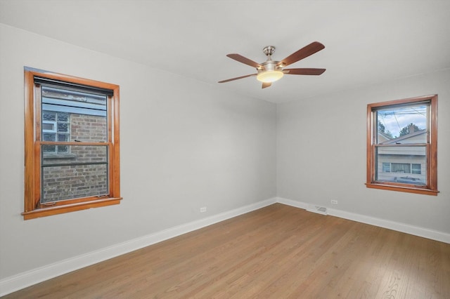 unfurnished room with light hardwood / wood-style floors and ceiling fan