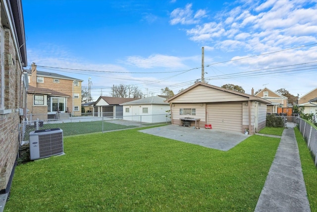 view of yard featuring a patio and central air condition unit