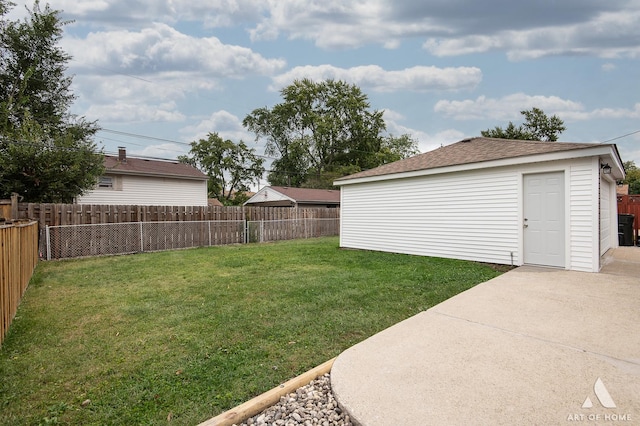 view of yard featuring an outdoor structure and a patio