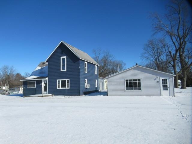 view of snow covered property