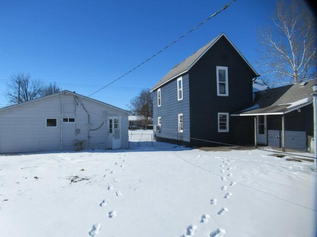 view of snow covered property