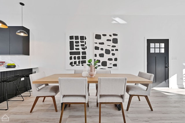 dining room featuring light hardwood / wood-style flooring