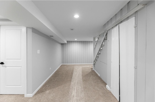 basement with light carpet