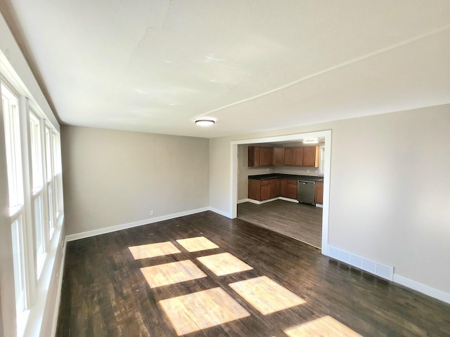 empty room featuring dark hardwood / wood-style floors