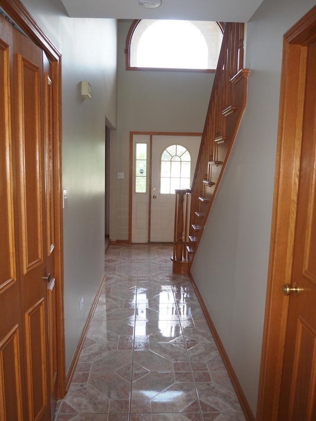 doorway featuring a high ceiling