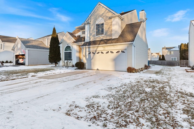 view of front of property with a garage