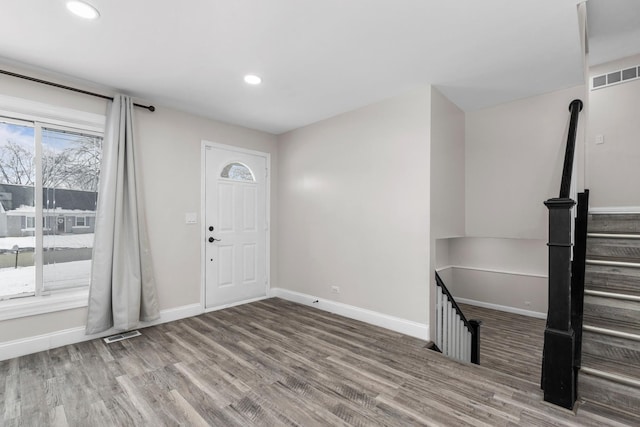 foyer entrance featuring hardwood / wood-style floors