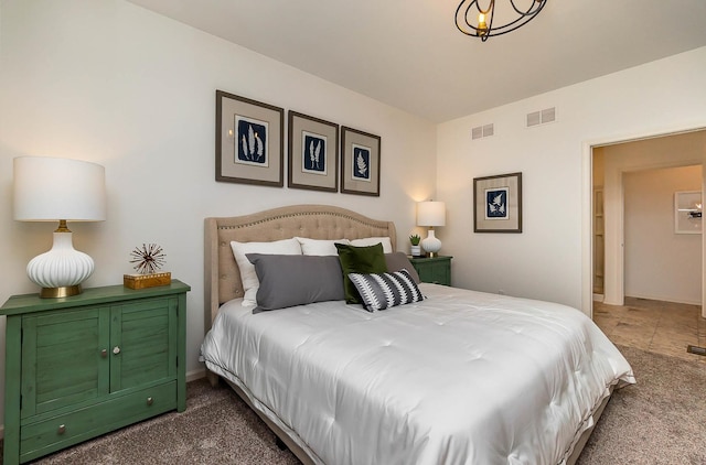 bedroom featuring dark colored carpet