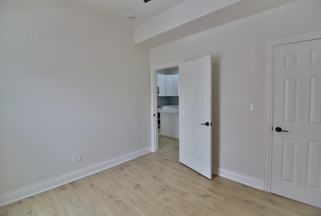 unfurnished bedroom with light hardwood / wood-style floors