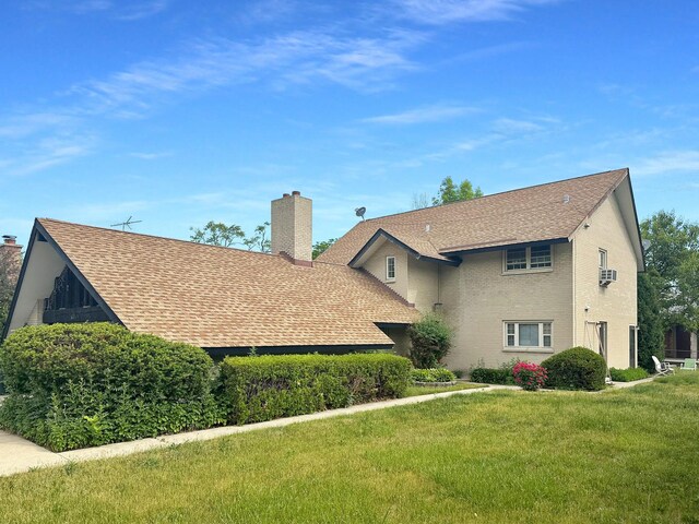 view of property exterior with a lawn