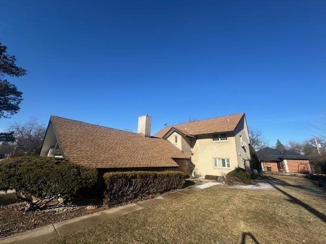 view of home's exterior featuring a lawn