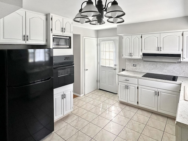 kitchen featuring a notable chandelier, white cabinets, and black appliances