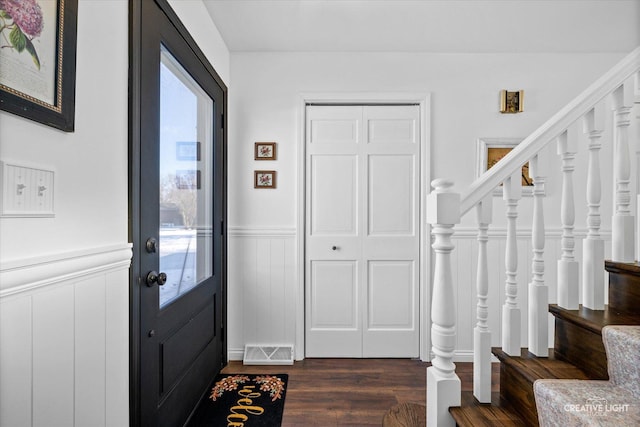 entrance foyer featuring dark wood-type flooring