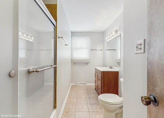 bathroom featuring tile patterned floors, walk in shower, toilet, and vanity