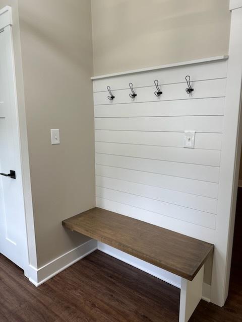 mudroom featuring dark wood-type flooring