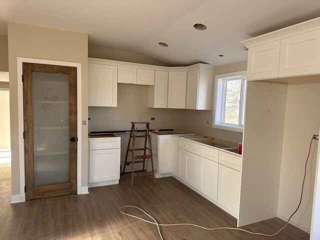 kitchen featuring sink, white cabinetry, and stainless steel appliances