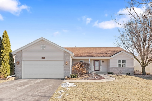 ranch-style home with a garage and a front yard