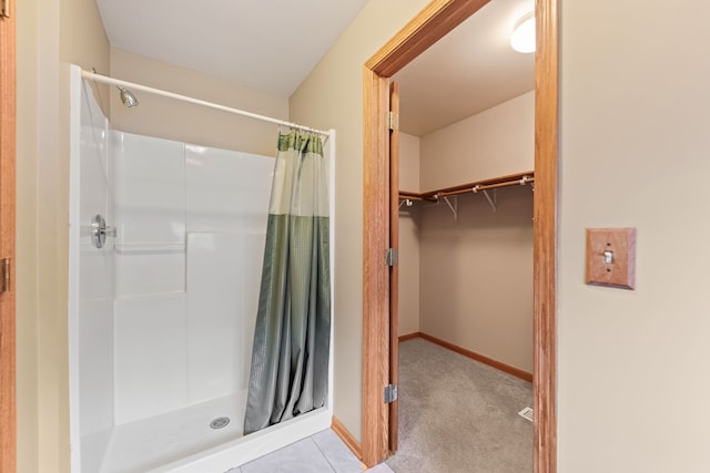 bathroom with a shower with curtain